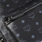 MCM Stark Visetos Medium Backpack – Black Monogram with Studded Detailing