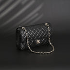 Chanel Classic Flap Bag – Black Quilted Caviar Leather with Gold-Tone Hardware