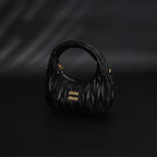 Miu Miu Matelassé Leather Hobo Bag – Black with Gold Hardware